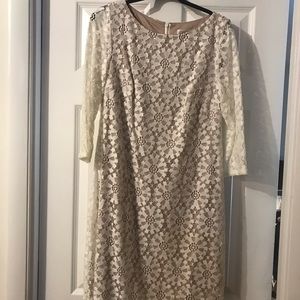 Lace dress, nude body underlay, sheer arms